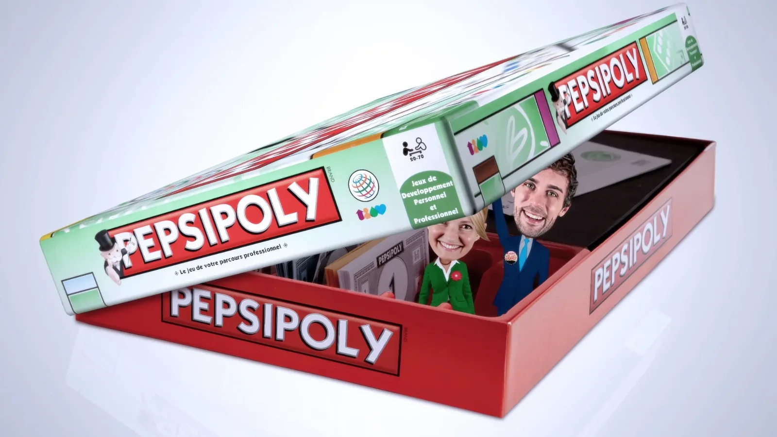 Boîte du jeu Pepsipoly ouverte, avec les figurines des deux personnages
